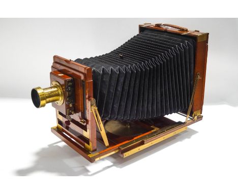 An early 20th century plate camera, by Thornton Pickard, with stand
