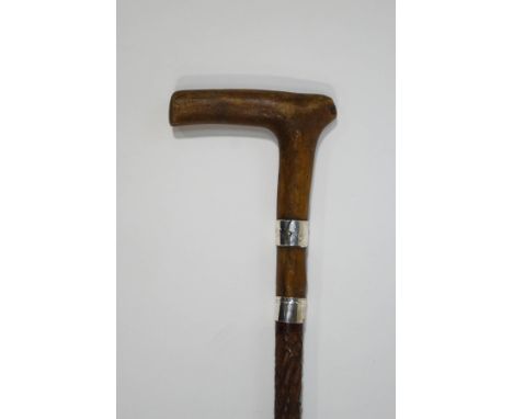 A malacca walking stick with wooden handle, 2 silver collars, Birmingham 1896