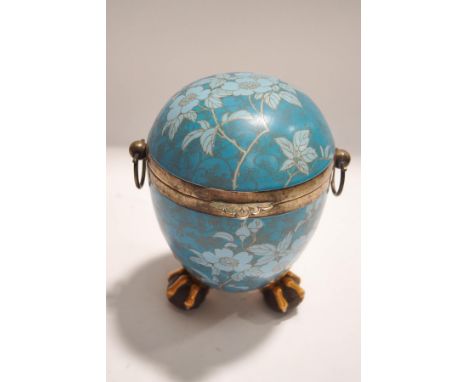 A 19th century earthenware tea caddy of egg form, with plated mount and handles, on claw and ball feet, 19cm high