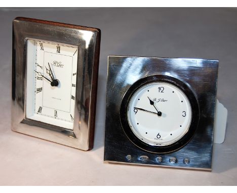 TWO SILVER FRONTED QUARTZ CLOCKS BOTH BY R.J. CARR ENGLAND, ONE CLOCK HAS AN ALARM FEATURE