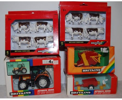 BRITAINS BOXED CATTLE FIGURES, A BRITAINS BOXED DIE CAST MODEL TRACTOR, A ROUND BALER AND A MINI TRACTOR.