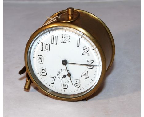 VINTAGE (CIRCA 1930) FRENCH MADE BRASS CASED DRUM CLOCK. JEWELLED BALANCE ESCAPEMENT MOVEMENT WITH ALARM FEATURE RINGING ON A