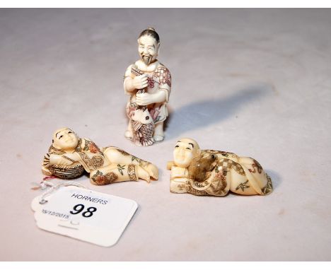 NETSUKE ' RECLINING FIGURES' AND A SMALL SIMILAR SCENT CONTAINER WITH REMOVABLE HEAD STOPPER.