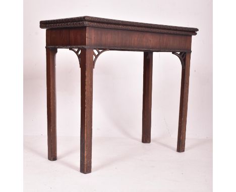 A Chinese Chippendale manner 19th century mahogany fold top games / card table. The table having a rectangular top with carve