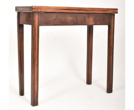 A George III early 19th century mahogany fold top card / games table. The table having a rectangular foldout top with fitted 