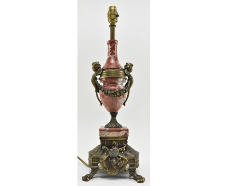 A French fin de siècle inspired 20th century gilded bronze &amp; marble table lamp light. The lamp having an urn-shaped body 