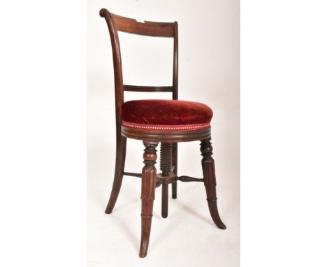 A 19th century rosewood &amp; upholstered adjustable harp / music chair stool. The harpitsts chair having a scrolled back res