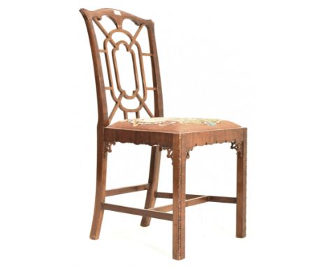 A Chinese Chippendale late 18th / 19th century mahogany dining chair. The chair having a pierced web-shaped backrest with car