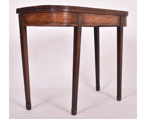 A George III early 19th century mahogany &amp; ebonised cross banded inlaid card game table. The table having a folding top o