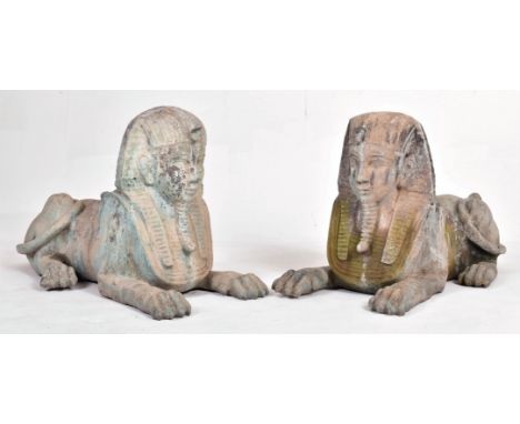 A pair of large 20th century hollow cast bronze garden Egyptian sphinxes. Of hollow cast bronze construction, each with verdi