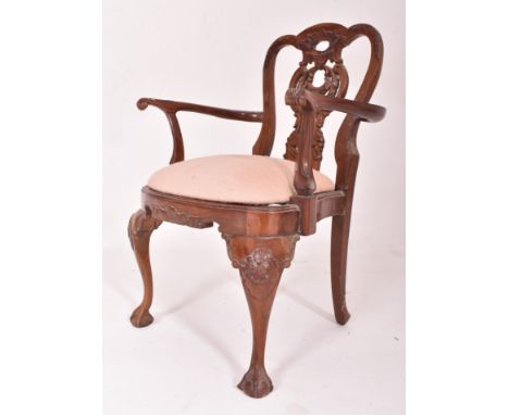 A 20th century mahogany Chippendale inspired miniature / apprentice piece carved chair. The chair having a pierced vase back 