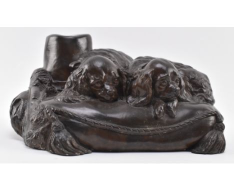In the manner of Charles Valton (French, 1851-1819) - An early 20th century bronze figure depicting a pair of King Charles sp