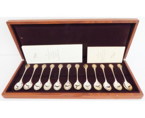 A wooden cased set of 12 Royal Society for the Protection of Birds silver spoon collection: detailing various birds highlight