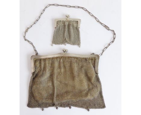 An early 20th century continental .800 grade silver evening purse with chain suspension (16.75 cm wide x 14 cm high) (Total w