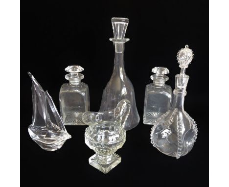 A group of six:1. a  Daum clear glass yacht with etched mark (21.5 cm high); 2. a pair of late-Victorian square decanters wit