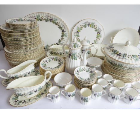 An extensive Royal Worcester 'Lavinia' (blackberry design) dinner service comprising:21 x 23cm, 19 x 27cm, 12 x 15.5cm and 6 