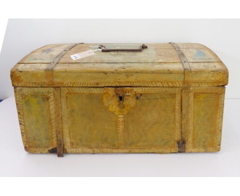 A late 18th/early 19th century dome-topped continental pine trunk: ironwork carrying handle between two iron strengthening st