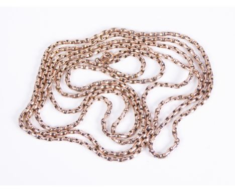 An antique 9ct rose gold guard chain: marked '9C', the faceted cable link chain approx. 140 cm long, the clasp rolled gold. (