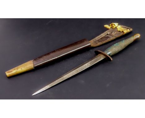 The 'F-S Fighting Knife' by Wilkinson Sword Co. Ltd, London (both sides engraved): textured brass handle and within original 