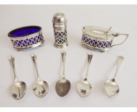 A three-piece hallmarked silver cruet set and&nbsp;five hallmarked silver coffee spoons. The cruet comprising: oval mustard w