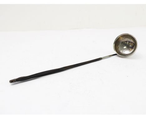 A Georgian white-metal toddy ladle with whalebone handle (apparently unmarked) (29 cm). (The bowl 5.7 cm in diameter)