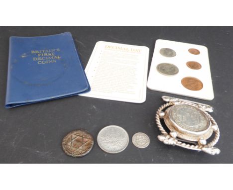 A mixed lot of coins comprising:&nbsp; a 1741 Emmanuel Pinto (Order of Malta) silver 2 scudi piece mounted in a white-metal f