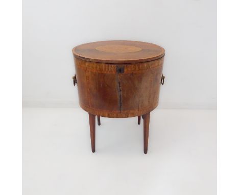 A late 18th century George III period mahogany, satinwood crossbanded and marquetry cellarette of oval form: the hinged lid w