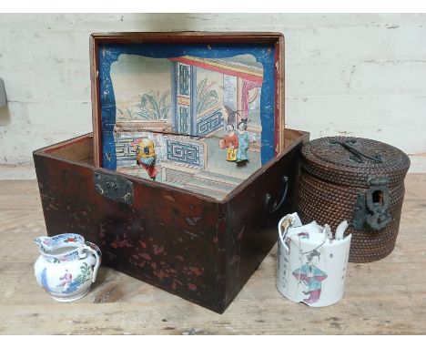 Assorted oriental items comprising a Chinese porcelain tea pot (AF), a wicker teapot holder and a decorated box, together wit