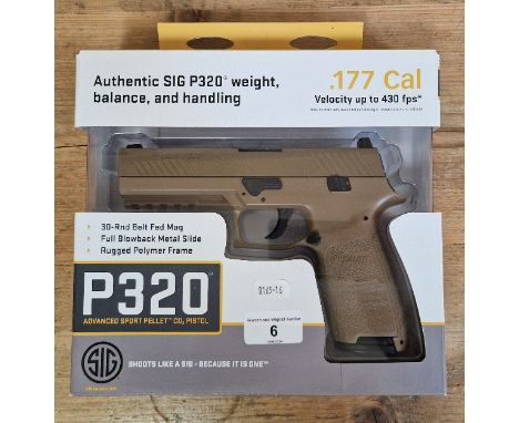 A Sig Sauer P320 .177 calibre Co2 air pistol, serial no.17E23912, 20cm long, in original box with manual. (BUYER MUST BE 18 Y
