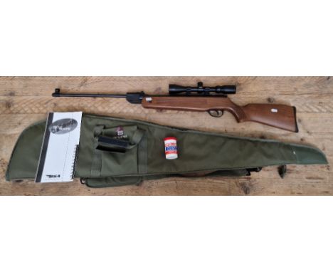 An Edgar Brothers mod 60 S .22 calibre air rifle, 112cm long, serial no.0907 16801 with BSA Essencial sight, tub of pellets, 