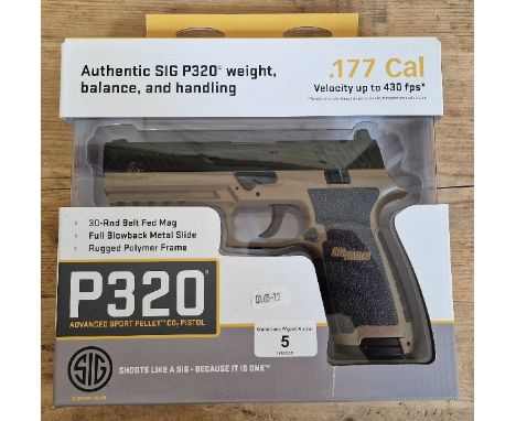A Sig Sauer P320 .177 calibre Co2 air pistol, serial no.17E24343, 20cm long, in original box with manual. (BUYER MUST BE 18 Y