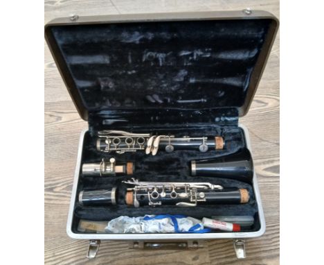 A Buescher 'Aristocrat' clarinet, in case.