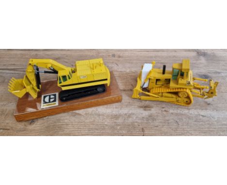 Two model costruction vehicles comprising of a NZG Caterpillar 245 no. 160-177 track-type excavator on plynth in box &amp; Co