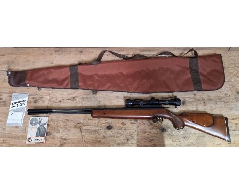 A Weihrauch HW 77 K .22 calibre air rifle, 111cm long, serial no.1023429 with Shrike Optical 4x32 sight, soft bag & manuals. 