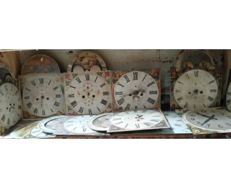 Various longcase clock dials and movements.  