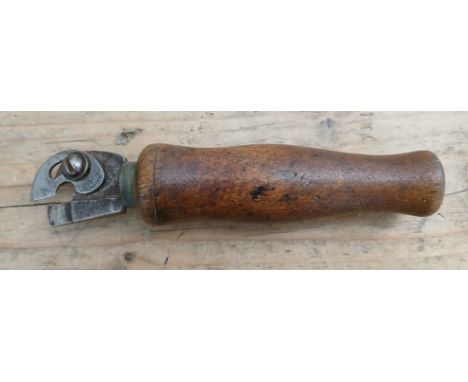 A vintage cobblers tool by Snell &amp; Atherton, wooden handle, length 16cm.