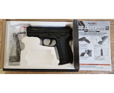 A Sig Sauer SP2022 4.5mm calibre Co2 air BB gun, serial no.SP 206 005 GN, 19cm long, in original box with manual. (BUYER MUST