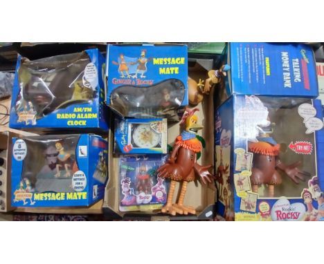 A collection of Chicken Run toys to include a radio alarm clock, 2 x message mate, talking money bank, interactive rockin' Ro