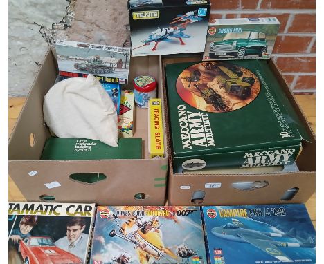 A box of assorted toys including Airfix, marbles, Meccano army set, telescope set.