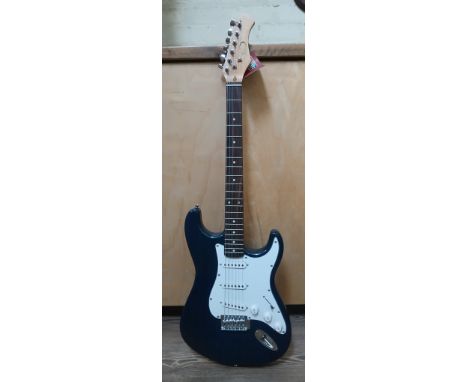 A Stagg electric guitar, blue finish with white pick guard.