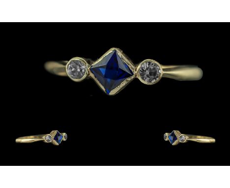 18ct Gold - Pleasing Petite 3 Stone Sapphire and Diamond Set Ring. Marked to Interior of Shank. The Raised Nine Sided Sapphir