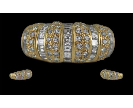 18ct Yellow Gold Attractive Diamond Set Dress Ring. Marked 750 - 18ct to Shank. The Princes Cut and Brilliant Cut Diamonds of