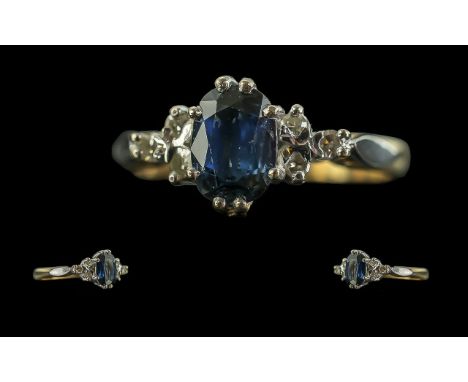 18ct Gold Attractive 3 Stone Sapphire and DIamond Set Ring. Marked 18ct to Interior of Shank. The Old Cut Diamonds of Good Co