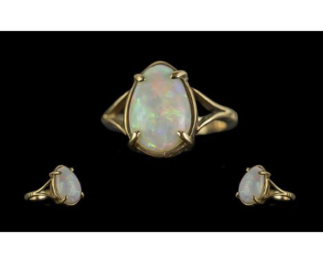 Antique Period 9ct Gold Single Opal Set Ring. Marked 9ct to Shank. The Opal of Excellent Colours - Orange, Green and Blues. E
