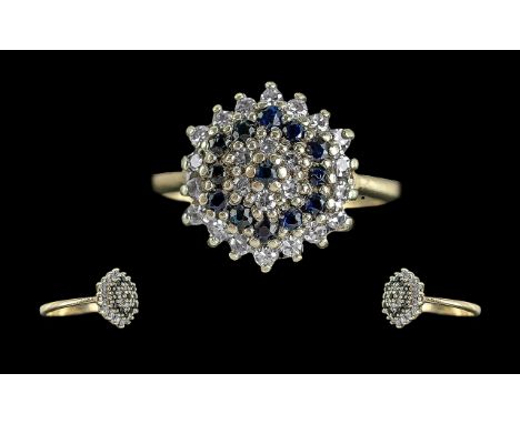 Ladies 9ct Gold Attractive Sapphire and Diamond Set Cluster Ring. Flower head Setting. Full Hallmark to Interior of Shank. We