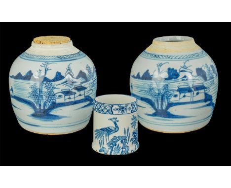 18th Century Pair of Chinese Ginger Jars, decorated with scenes of mountains and fishermen, blue glazed, measure 8.5'' high. 