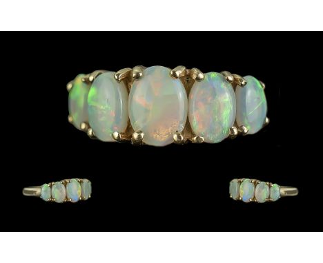 Ladies Attractive 9ct Gold 5 Stone opal Set Ring. Full Hallmark to Interior of Shank. The Five Well Matched Opals of Good Mul