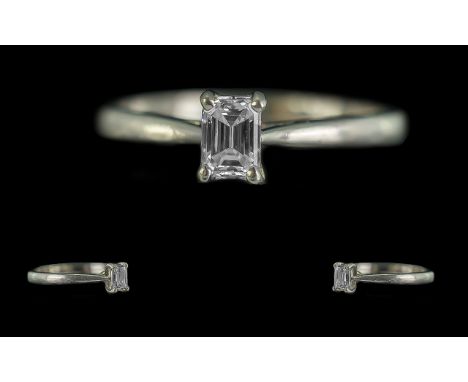 An Excellent Platinum Single Stone Diamond Set Ring. Stamped 950 Platinum to Shank. The Step-cut Diamond of Excellent Colour 