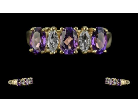 14ct Gold Attractive Amethyst and Sapphire Set Dress Ring.  Marked 585 - 14ct to interior of shank.  Good colours and clarity