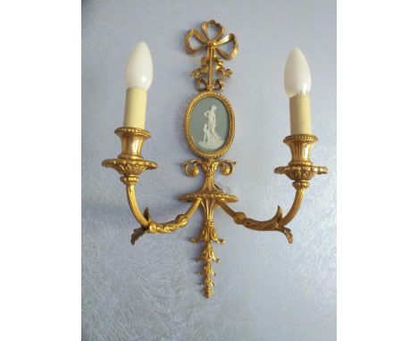 Four Ormulu &amp; Wedgwood Jasper Light Fittings,  twin candle fittings with oval Jasper plaque to centre below a gilt bow.